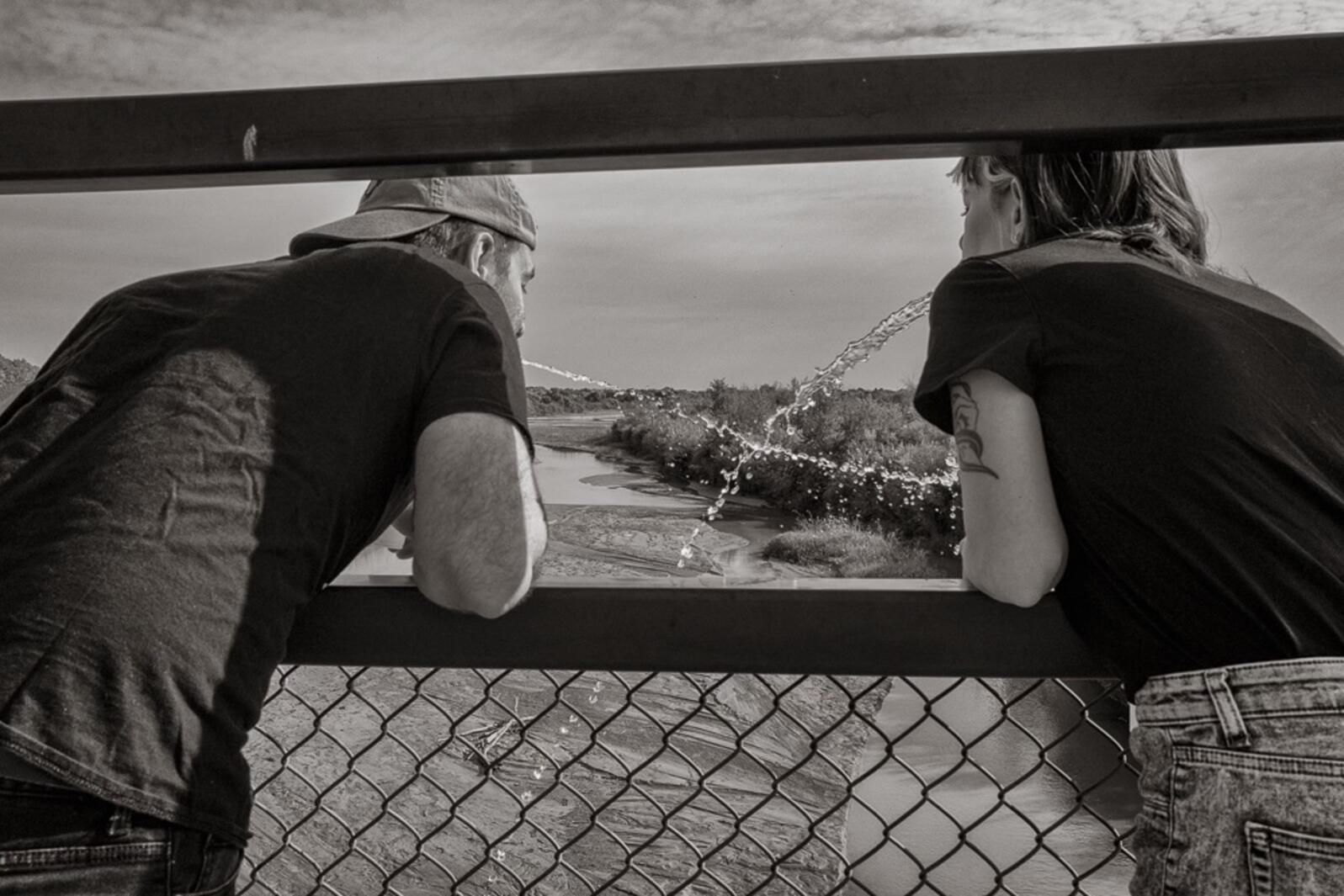 Joe and Amanda tithing back to the Rio Grande, Albuquerque, New Mexico, October 2022. Concept by Paula Castillo, photograph by Don Usner. 